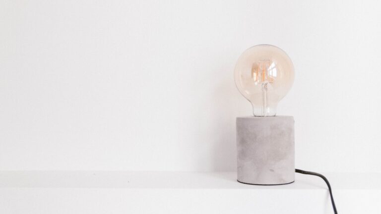 light bulb on white panel