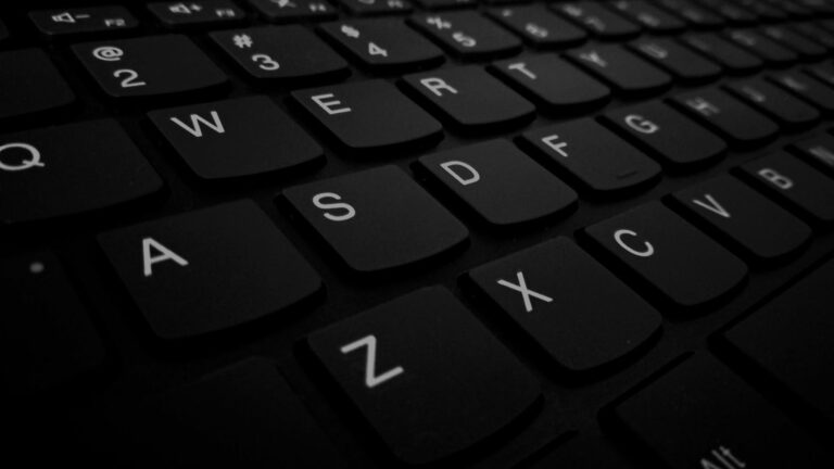 closeup photo of black computer keyboard s left side keys