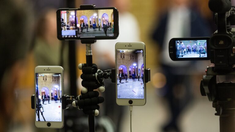 smartphones hanging on the tripod