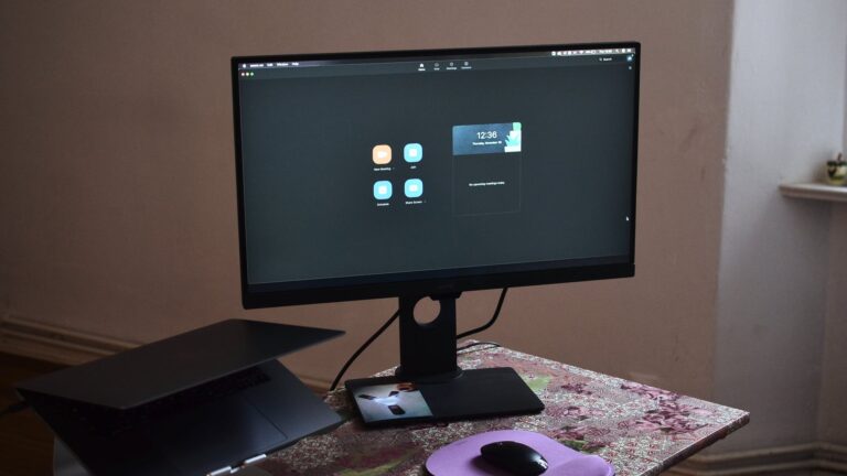 modern computer with laptop on table